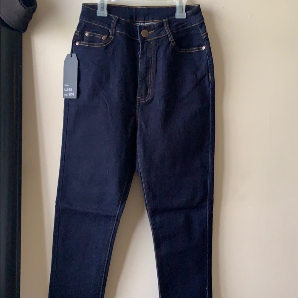 Very high rise dark denim jeans